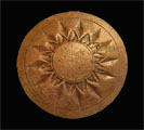 button with sun design